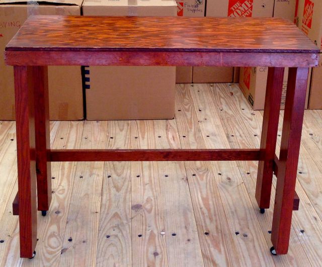 My typing table in the storage unit with all the boxes I moved behind it.
