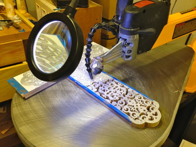 Here's the cross on the scroll saw.  Yes, I have to use the magnifier to see while cutting.