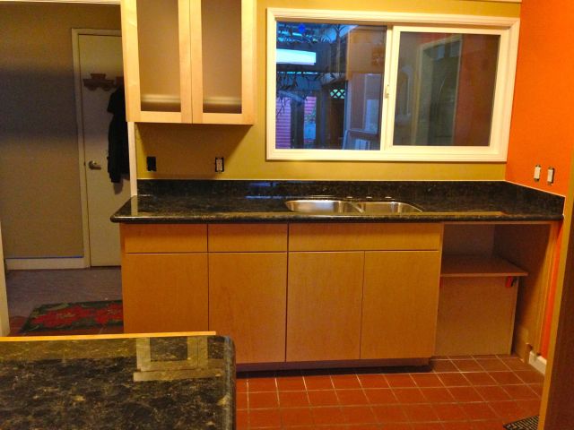 The new granite counter tops. We picked a contrasting color to highlight the cabinets.