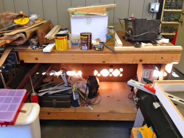 Here is the outside work bench with all it's junk. There will be 6 new pullout shelves to store and organize this stuff.