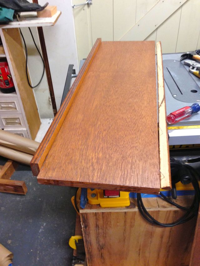 One of the old bookcase shelves.  Needed to remove the edging.