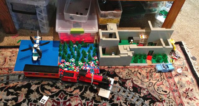 House next to the train tracks.