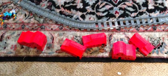 Little shacks next to the tracks.