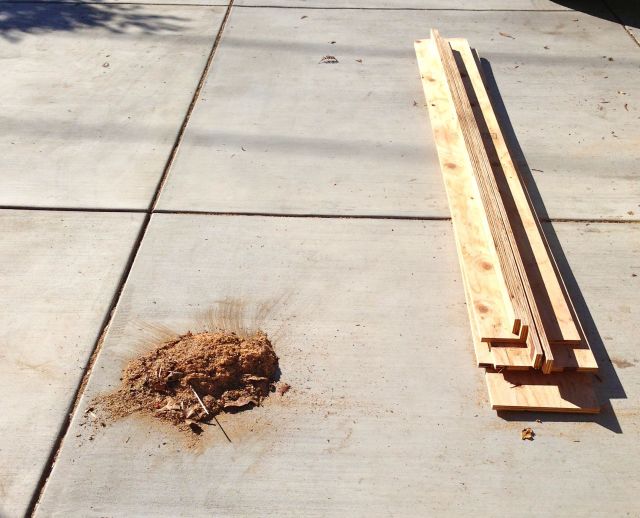 The total output of an hour's work: One pile of plywood and one pile of sawdust. 