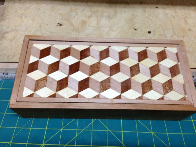 Parquetry finished. The cubes have a cherry veneer boarder.