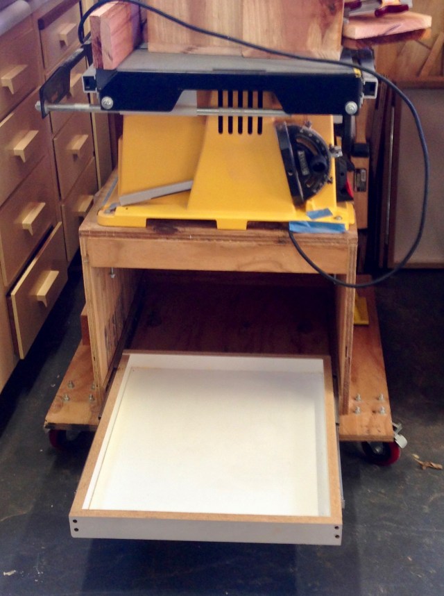 Pull out storage for the table saw stand.